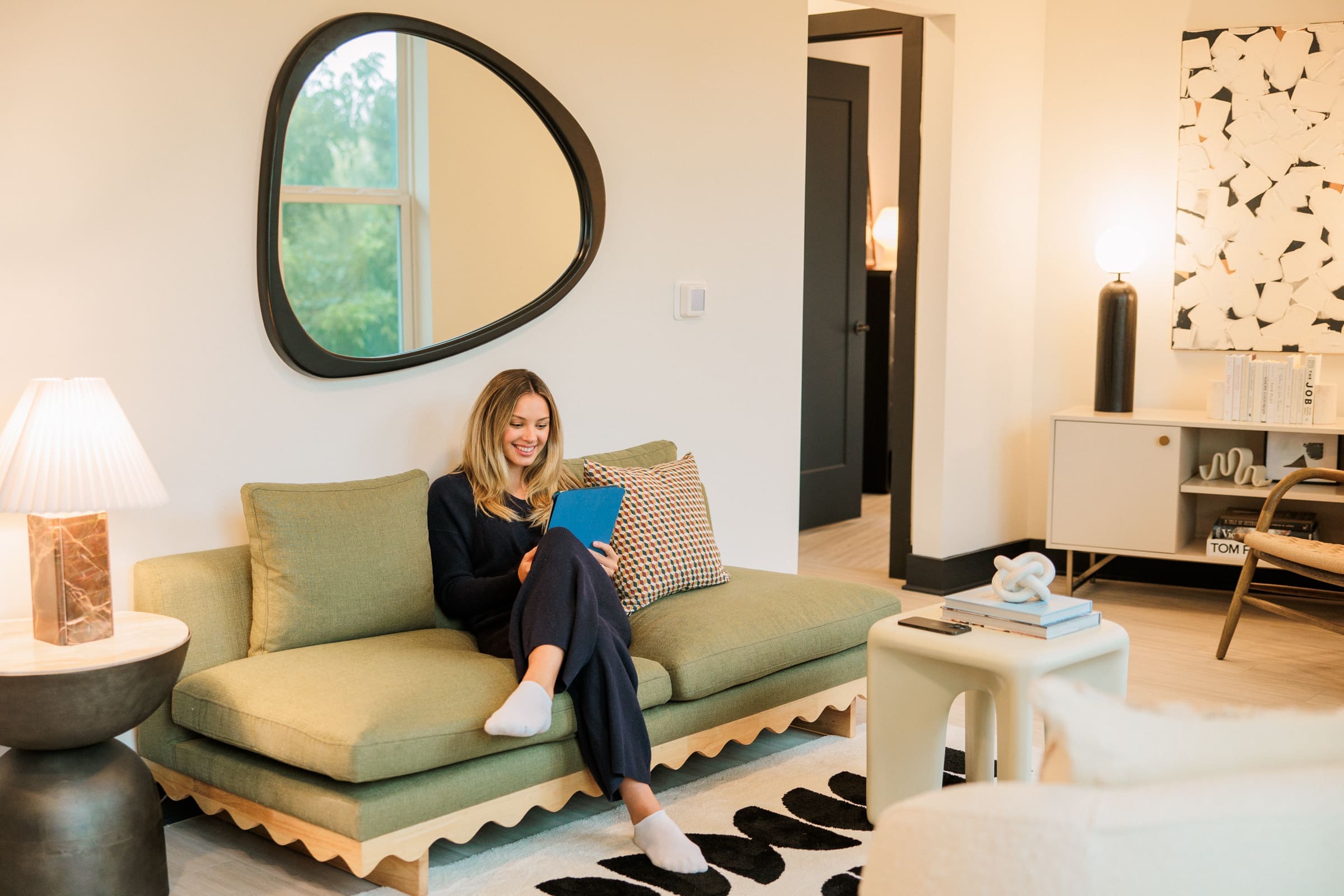 woman reading in living room