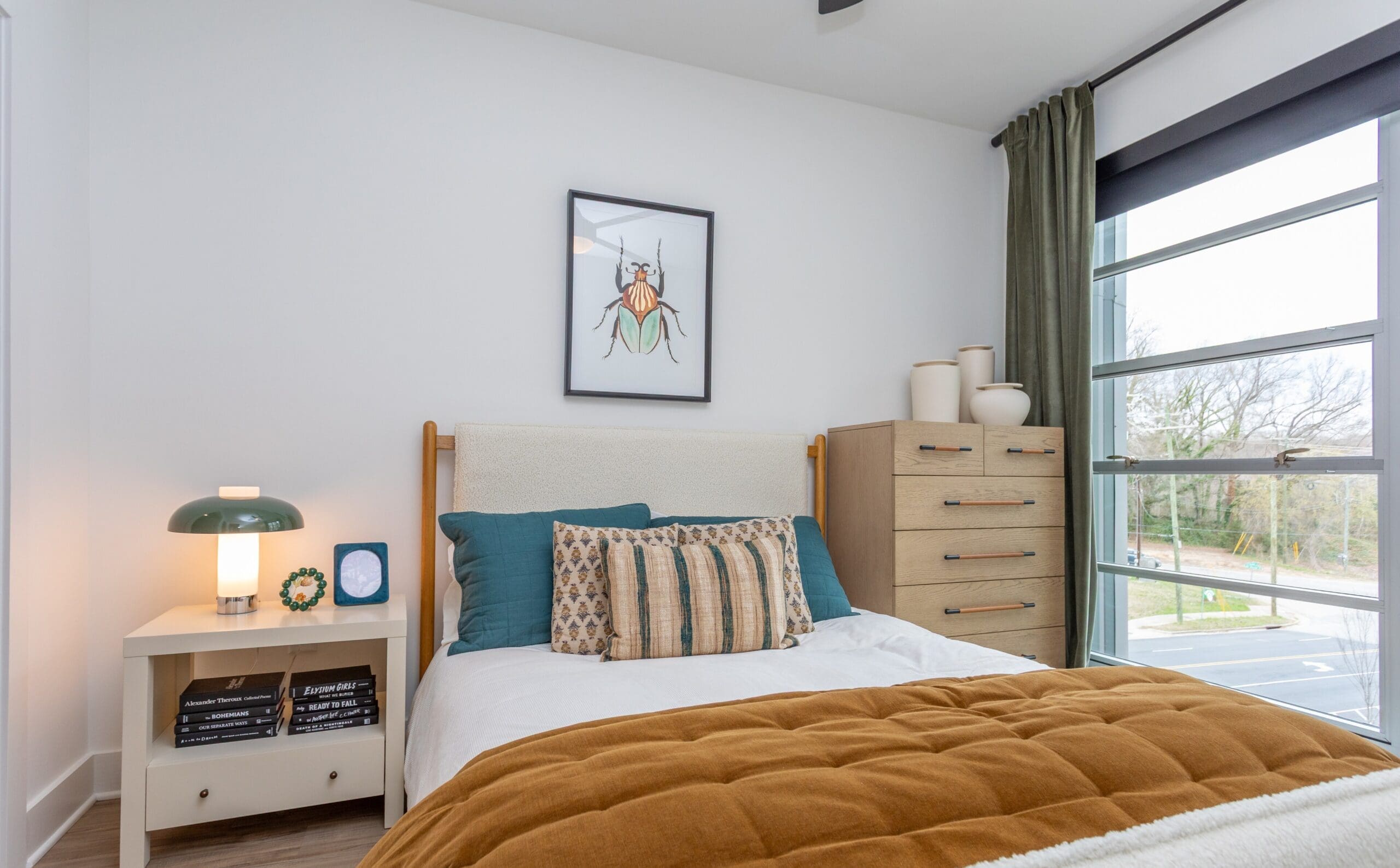 furnished bedroom at the row